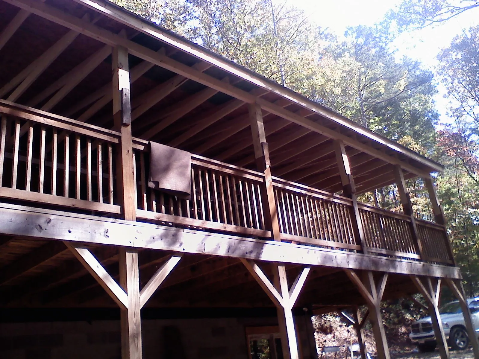 Timber framing under a new elevated porch and deck — Roof Leak Repair in Osceola by Roofing Brothers